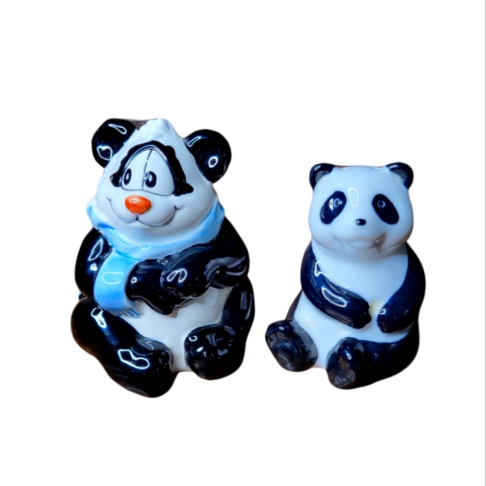 Pair of mismatched panda shakers
